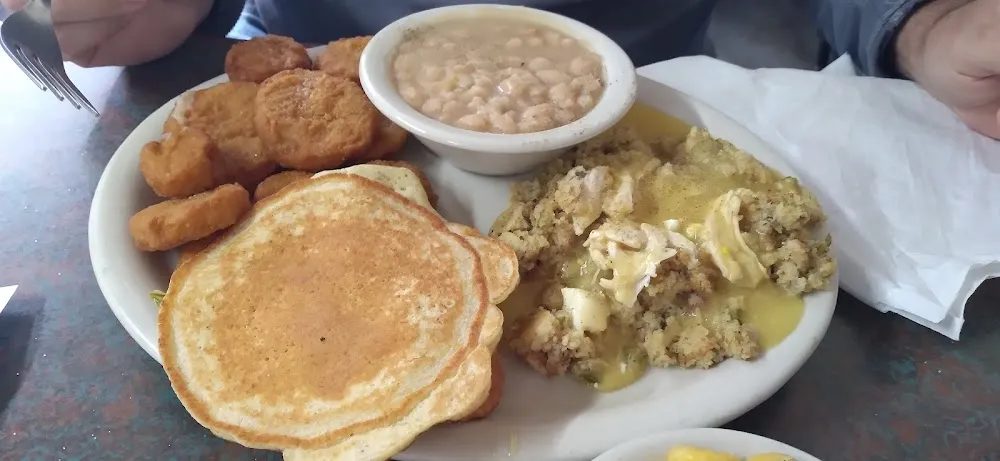 Chicken and Dressing Mac and Cheese Fried Squash White Beans and Jalapeño Hoe Cake